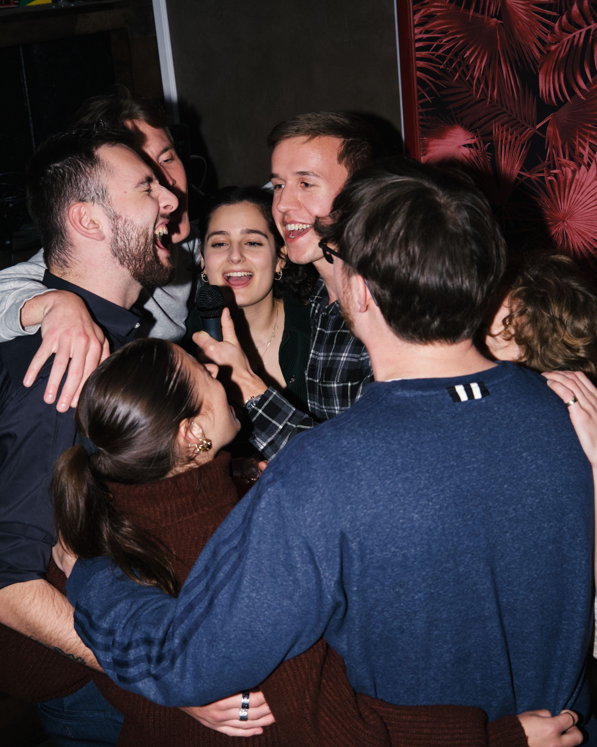 A group of people singing at karaoke in Copenhagen